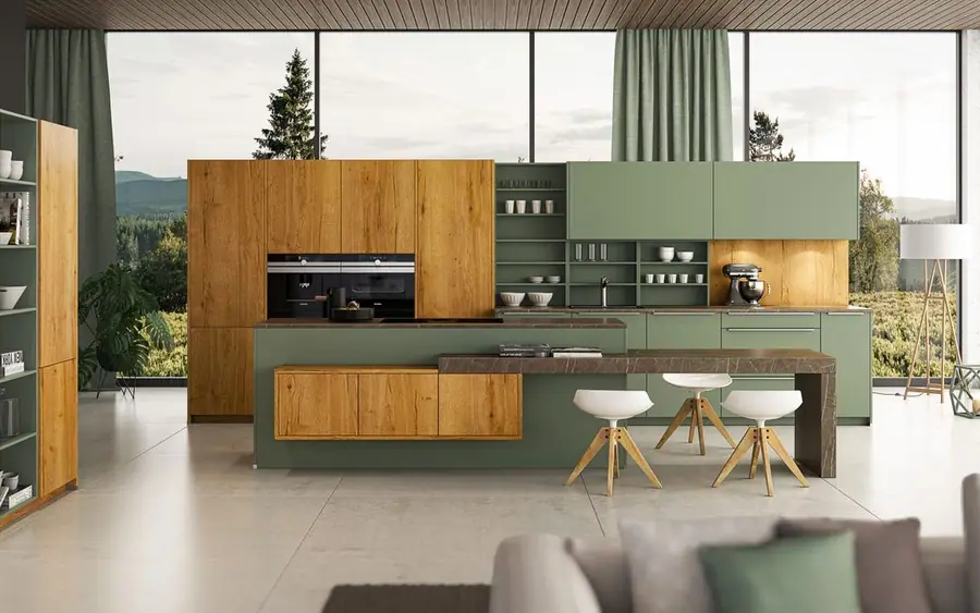 Cuisine vert eucalyptus et chêne doré ouverte sur le séjour